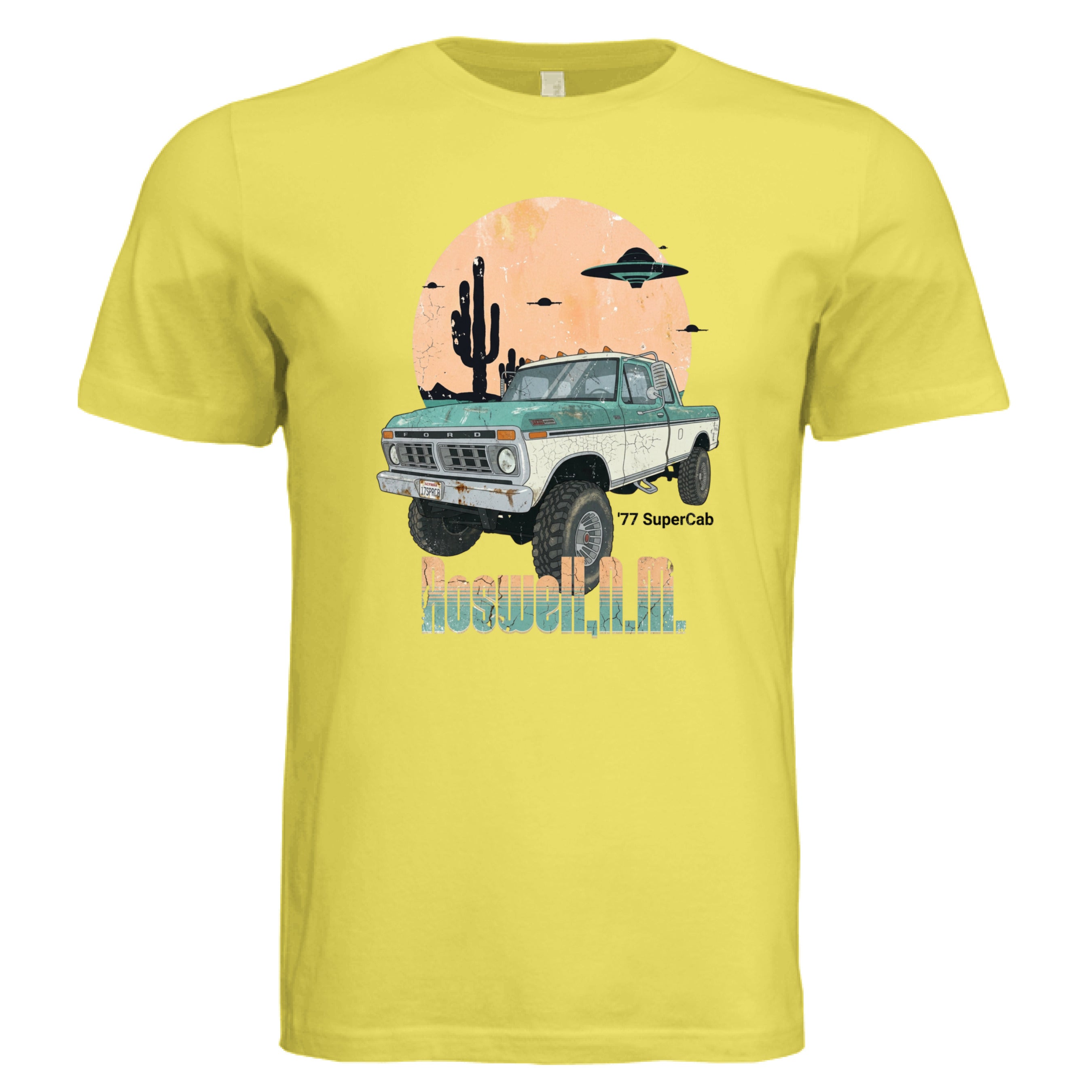 Yellow t-shirt with a graphic of a truck and desert scene on a white background