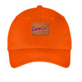 Orange cap with a brown patch featuring the word 'Strutter' on a white background