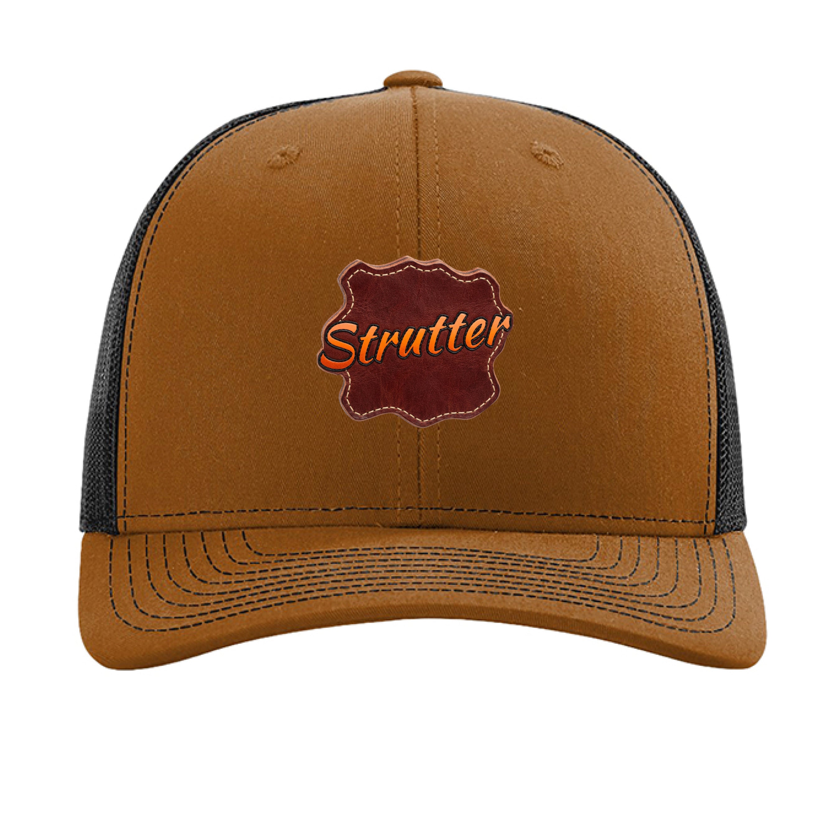 Brown and black trucker cap with 'Strutter' logo on a white background