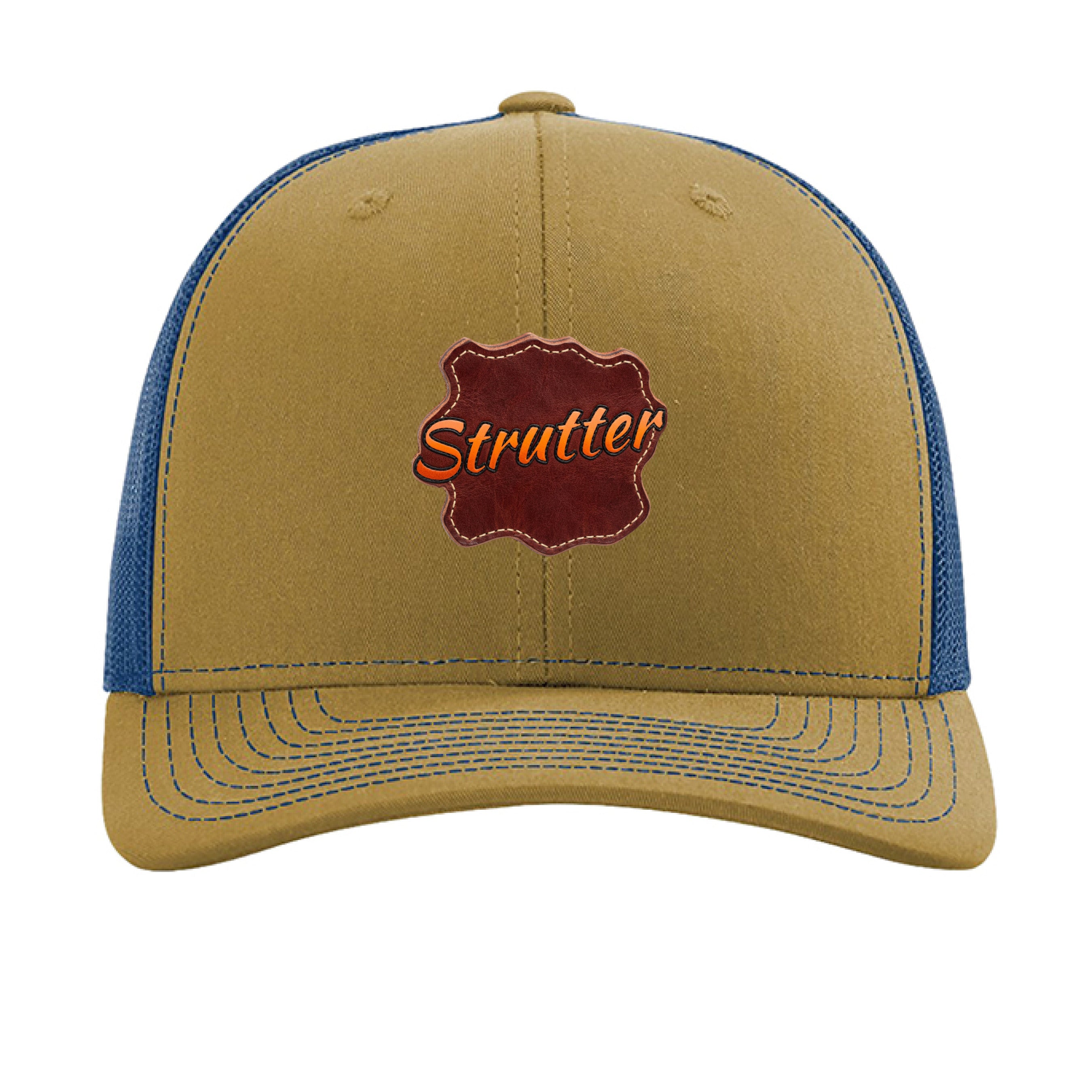 Beige and blue cap with 'Strutter' logo on a white background